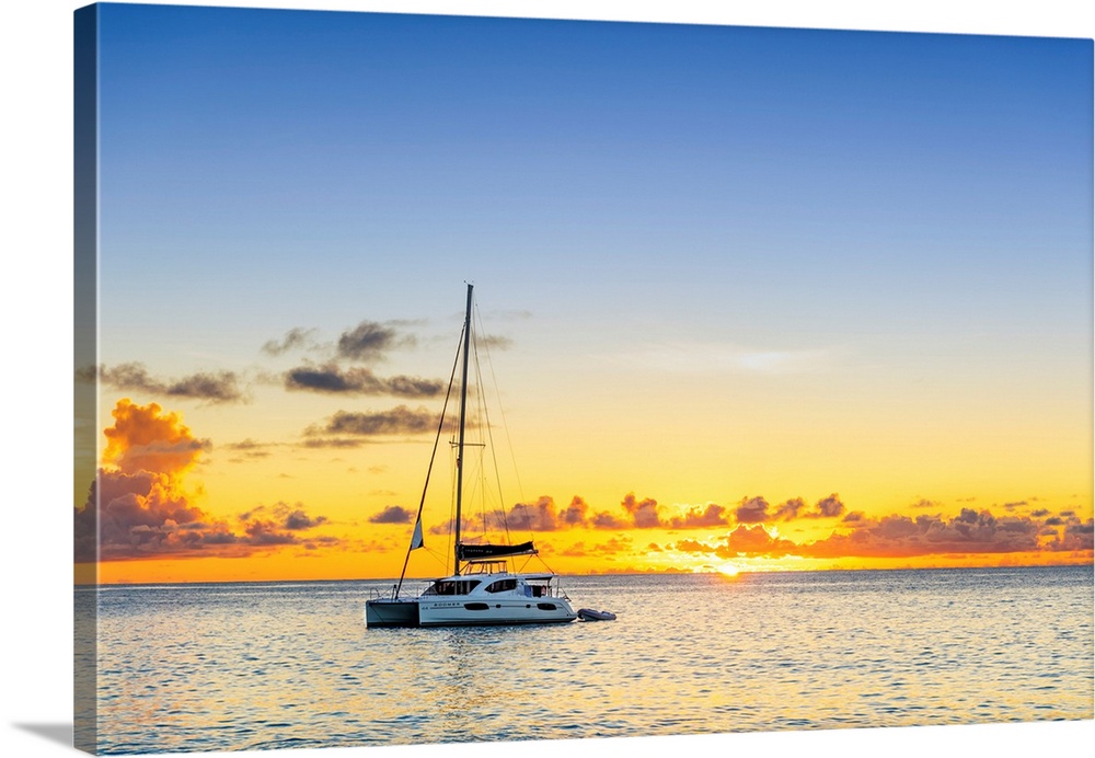 Berthed yacht in the bay of Anse Georgette, Praslin, Seychelles, Africa.