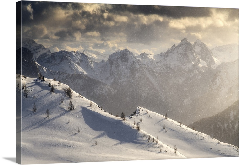 Blizzard conditions over the mountains around the Giau Pass during a spring evening. Dolomites, Italy.