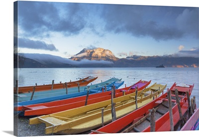 Boats on Lugu Lake at dawn, Yunnan, China