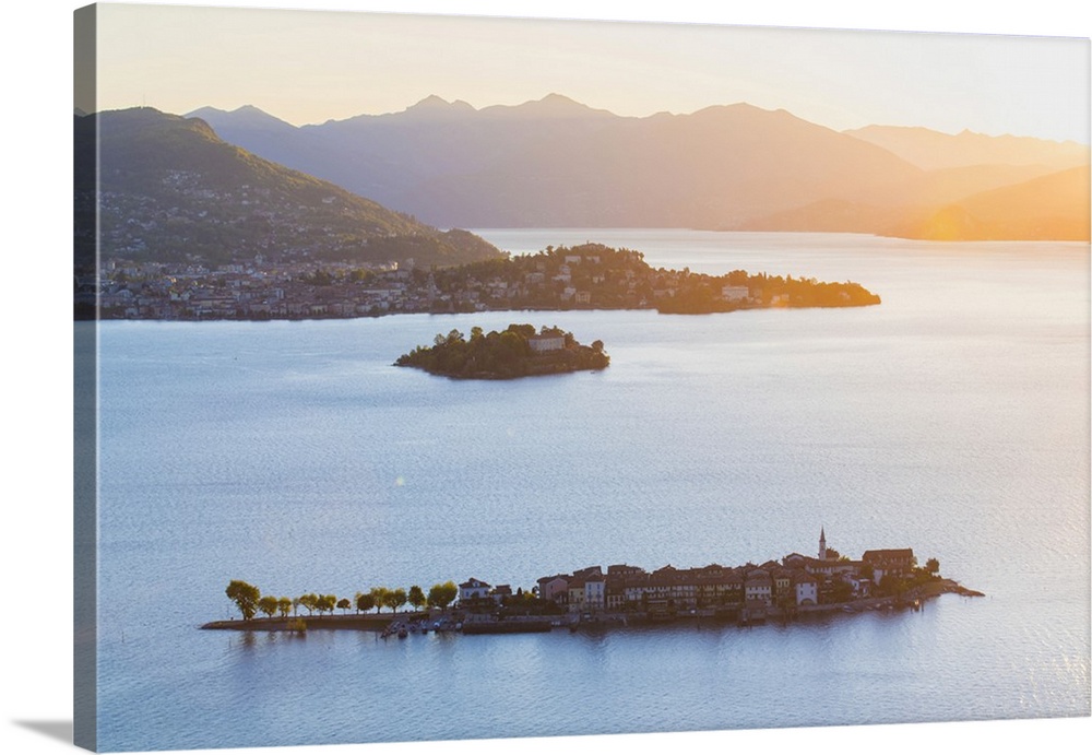 Borromean Islands, Stresa, Lake Maggiore, Verbano-Cusio-Ossola, Piedmont, Italy. View over the isles at sunrise.