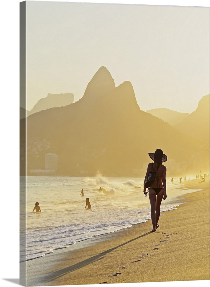 Brazil, City of Rio de Janeiro, Ipanema Beach and Morro Dois Irmaos at sunset.