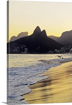 Brazil, City of Rio de Janeiro, Ipanema Beach and Morro Dois Irmaos during sunset