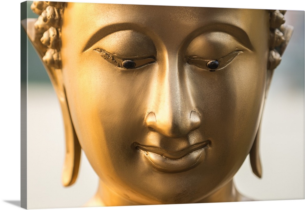 Buddha face, Seema Malaka temple on Beira Lake. Colombo, Sri Lanka.