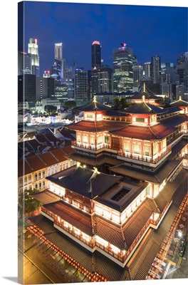 Buddha Tooth Relic Temple and skyscrapers at dusk, Chinatown, Singapore