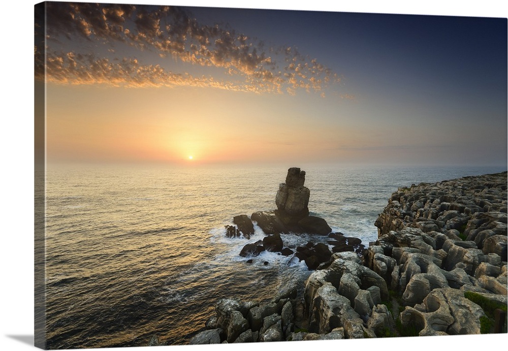 Cabo Carvoeiro and Nau dos Corvos at sunset, in front of the Atlantic Ocean. Peniche, Portugal.