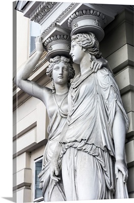 Caryatid sculpted female figure statues in the historic centre, Vienna, Austria