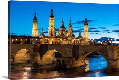 Cathedral Of Our Lady Of The Pillar And Stone Bridge At Dusk. Zaragoza, Aragon, Spain