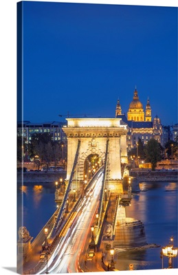 Chain Bridge (Szechenyi Bridge) And St. Stephen's Basilica At Dusk, Budapest, Hungary