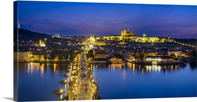 Charles Bridge and Prague Castle on the Vltava River at dusk, from Old Town Bridge Tower