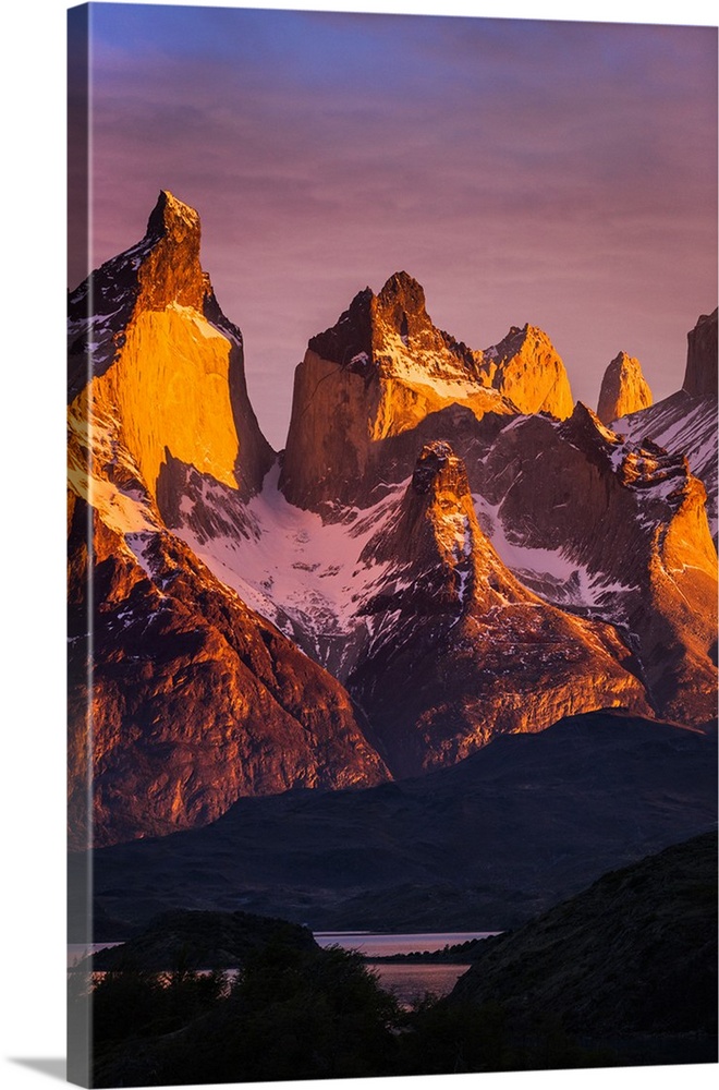 Chile, Torres del Paine, Magallanes Province. Sunrise over the peaks of Cuernos del Paine. .