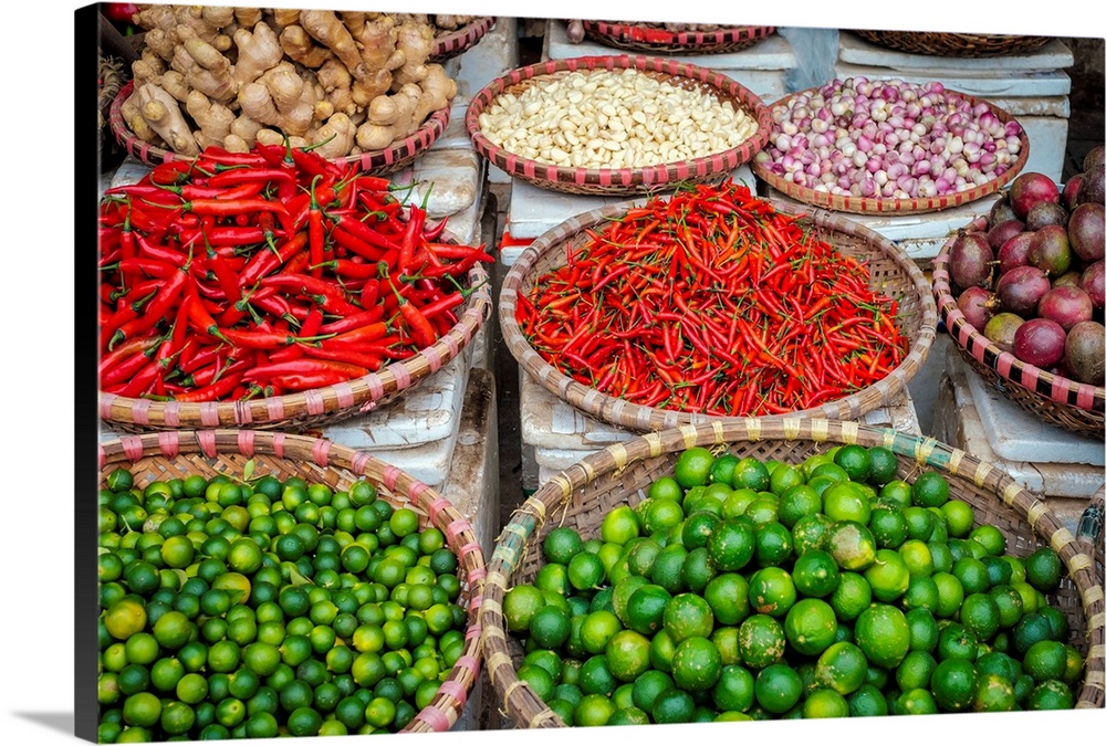 Chili peppers, limes and garlic for sale at Dong Xuan Market, Hoan Kiem District, Old Quarter, Hanoi, Vietnam.