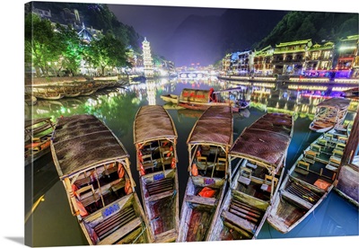 China, Fenghuang, traditional bamboo rafts and riverside houses
