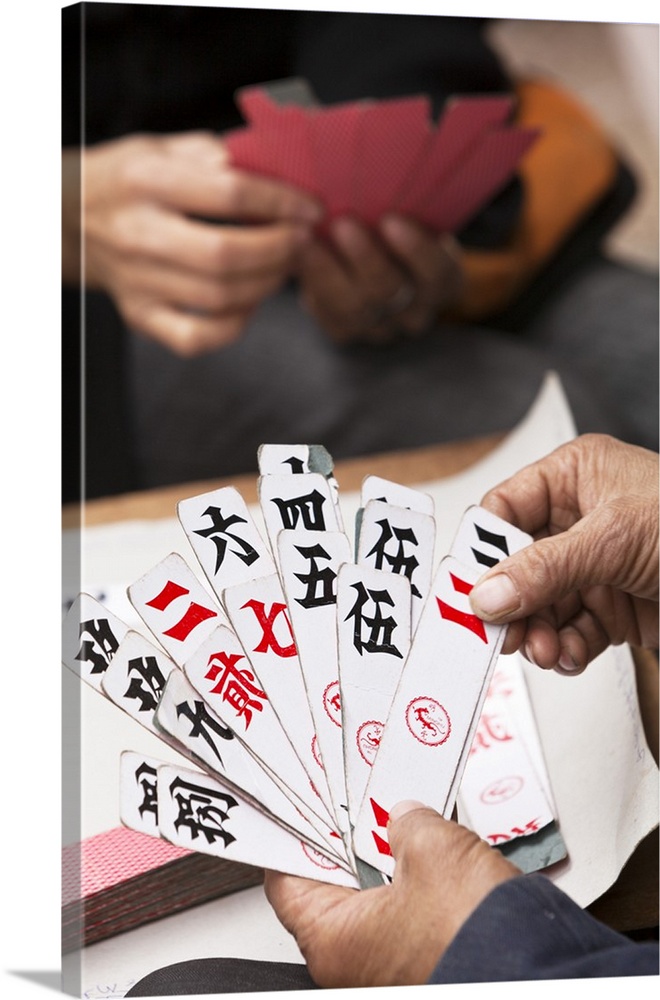 China, Yunnan, Yuanyang. Enjoying a game of cards.