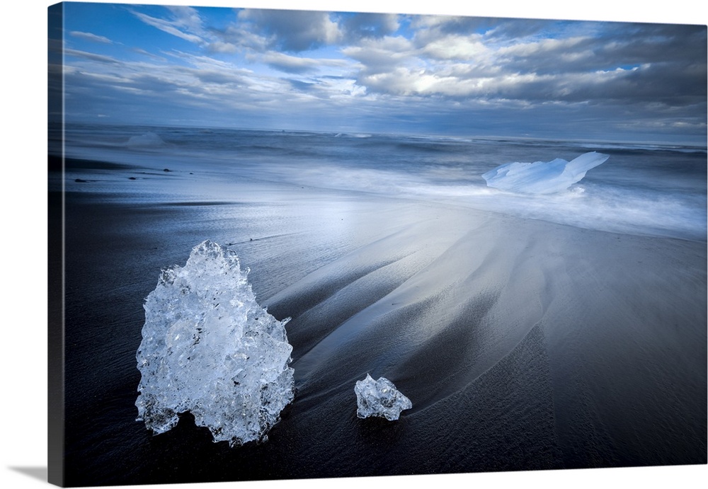 Chunks of ice on shore at Diamond beach near Jokulsarlon glacier lagoon, South Iceland, Iceland.