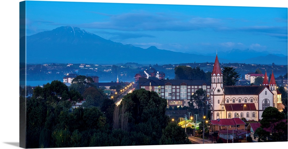 Church and Calbuco Volcano at dusk, Puerto Varas, Llanquihue Province, Los Lagos Region, Chile.