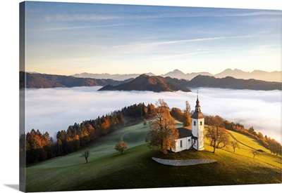 Church Of St. Thomas And The Kamink Savinja Alps In Winter, Skofja Loka, Slovenia