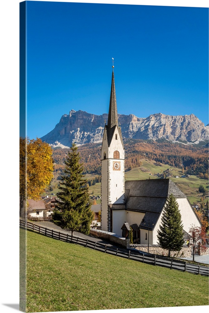 Church Of Stern Or La Villa In Front Of The Heiligkreuzkofel, Abtei Or Badia, Gadertal, Dolomites, South Tyrol, Italy