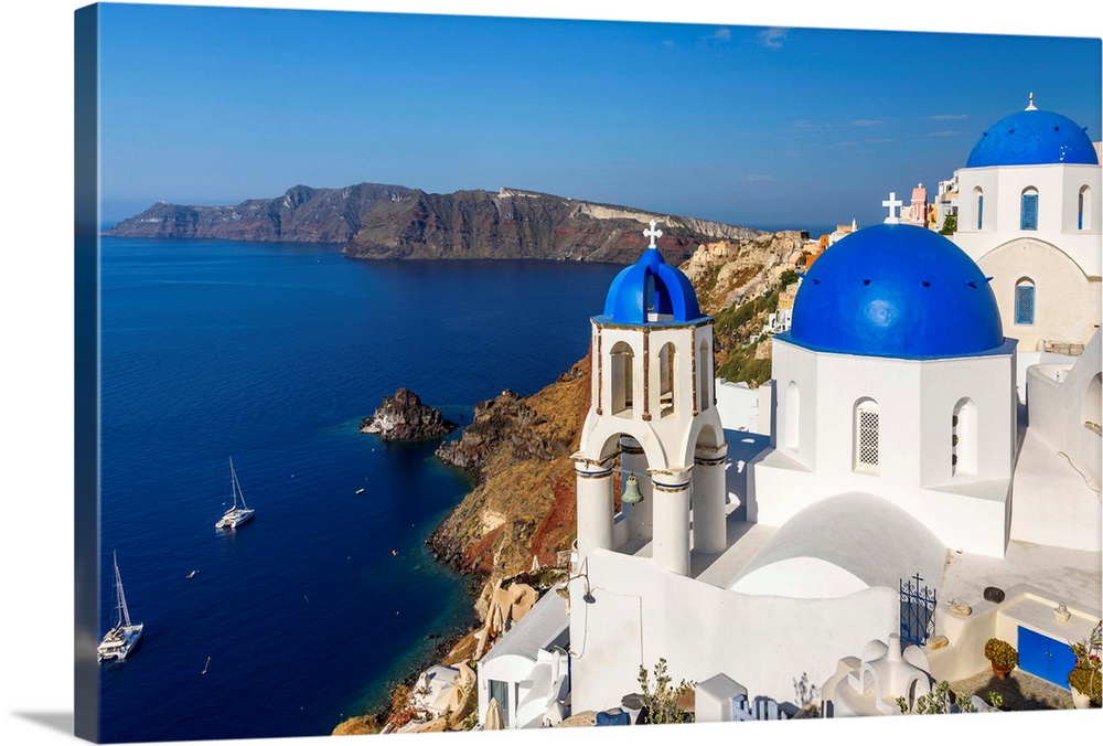 Church with blue domes in Oia, Santorini, South Aegean, Greece