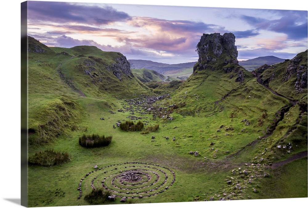 Circular rock pattern on green landscape near Castle Ewen at sunset, Fairy Glen, Isle of Skye, Highland Region, Scotland, ...