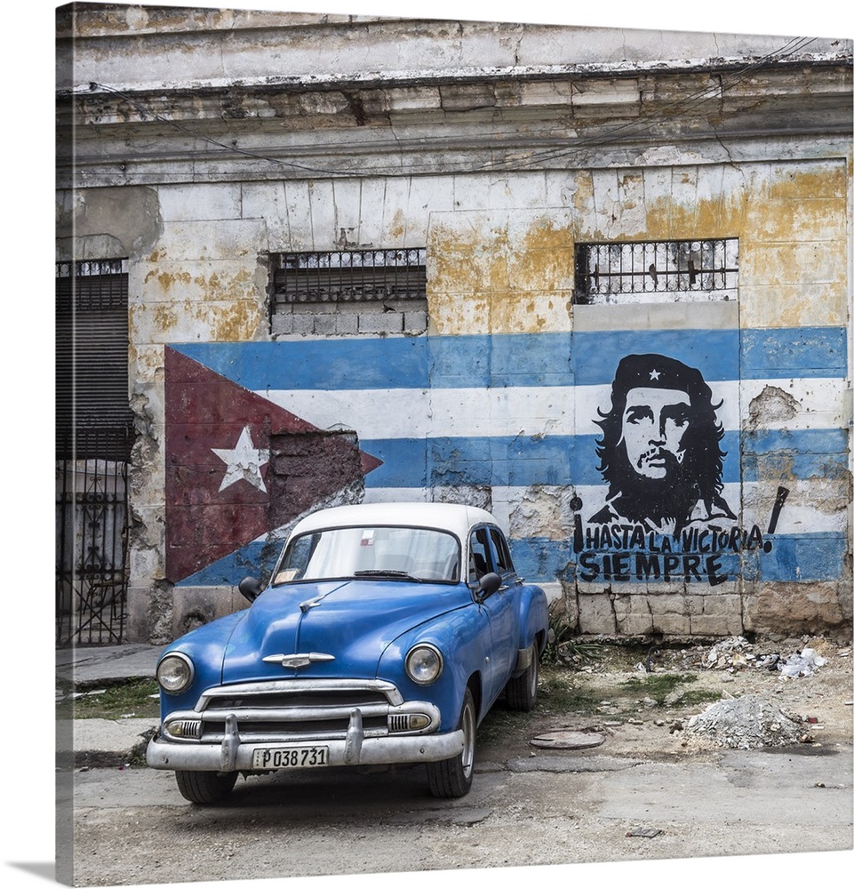 Classic American car and Cuban flag, Habana Vieja, Havana, Cuba.
