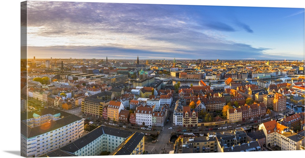Copenhagen, Hovedstaden, Denmark, Northern Europe. High angle view over the old town from the Our Savior church at sunset.
