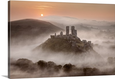 Corfe Castle At Dawn Surrounded By Mist, Dorset, England