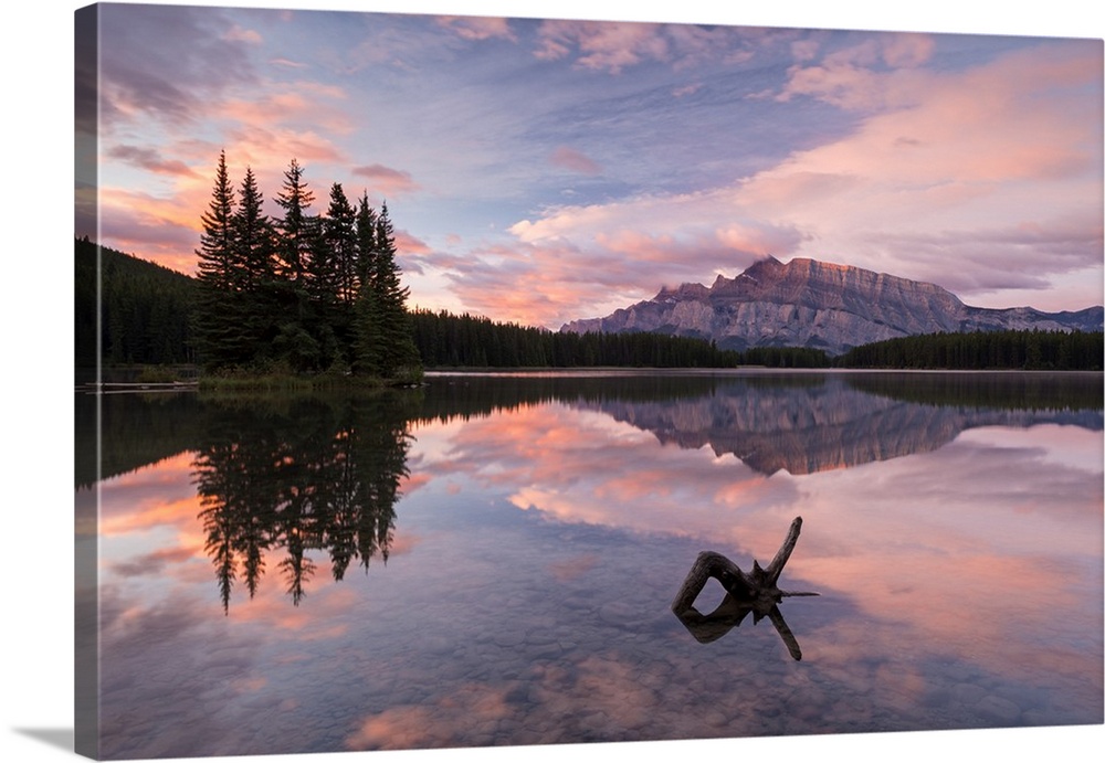 Colourful dawn sky above Mount Rundle and Two Jack Lake, Banff National Park, Alberta, Canada. Autumn, September, 2016.