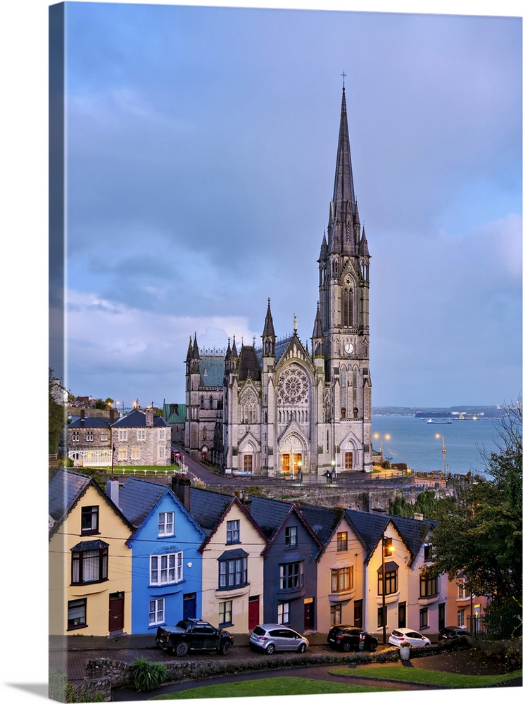 Deck of Cards colourful houses and St. Colman's Cathedral at dusk, elevated view, Cobh, County Cork, Ireland
