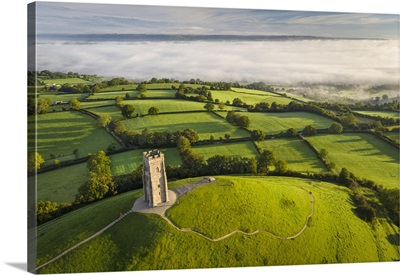 Early Morning Mists At St Michael's Tower On Glastonbury Tor In Somerset, England