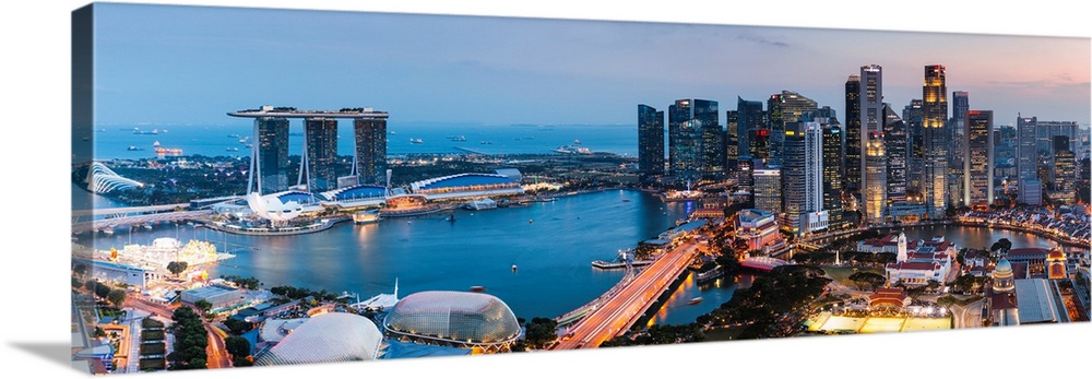 Elevated view of business district and Marina bay Sands at sunset, Singapore.