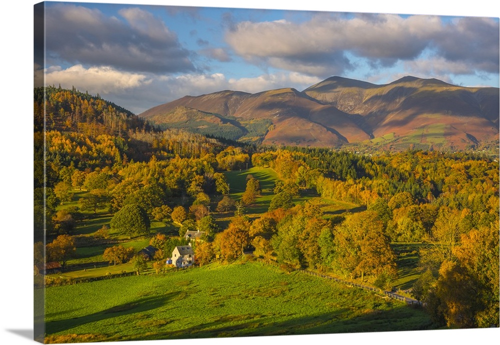 UK, England, Cumbria, Lake District, Derwentwater, farm house with Skiddaw mountain above Keswick in background.