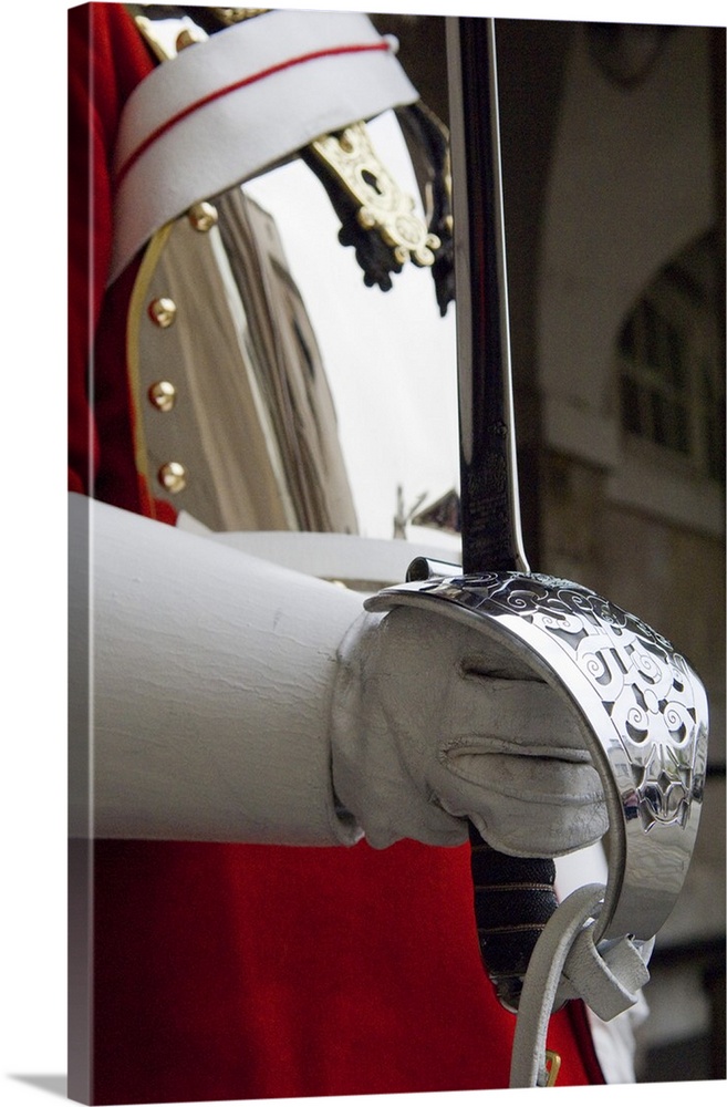 England, London. A Guardsman in the Household Cavalry holding a Ceremonial Sword.