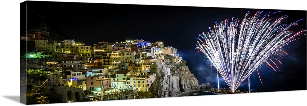 Europe, Italy, Liguria. Fireworks in Manarola for San Lorenzo.