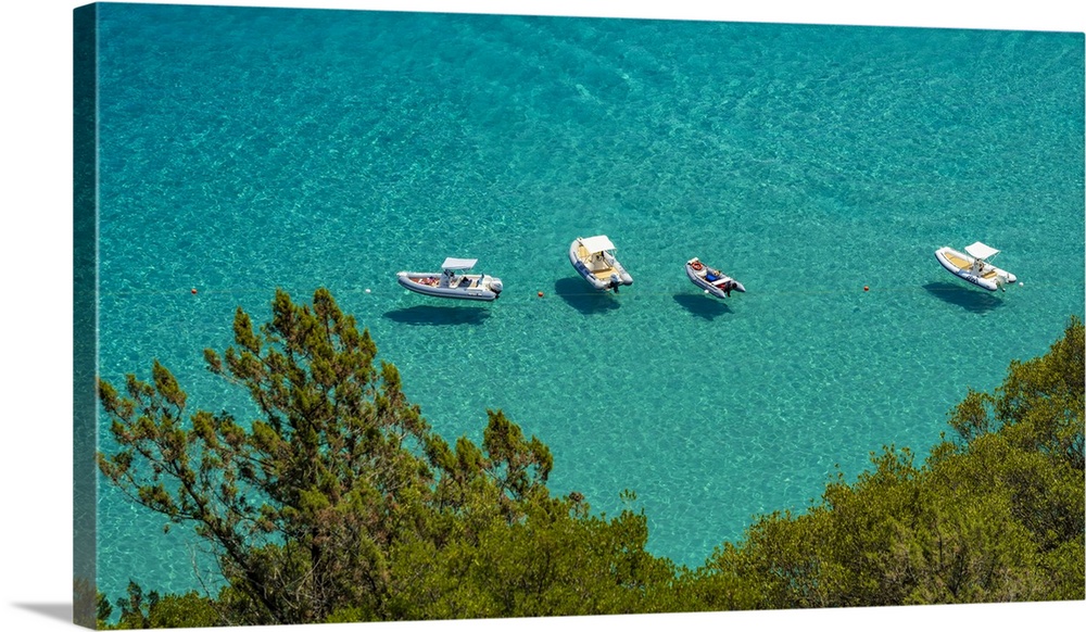 Europe, Italy, Sardinia. View of the boats in Cala Luna.