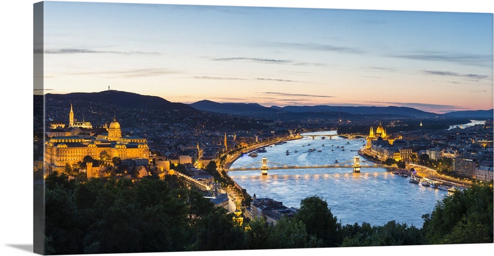 Hungary, Central Hungary, Budapest. Evening view over Budapest and the Danube from Gellert Hill.