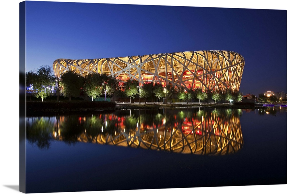 Exterior of the Olympic Stadium, Datun, Beijing, China by night.