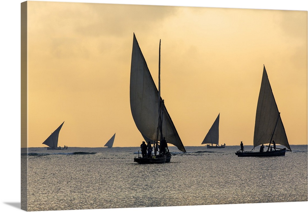 Kenya, Watamu, Kilifi County, Coast. Fishermen in traditional wooden sailing boats leave Watamu at sunrise to fish in the ...