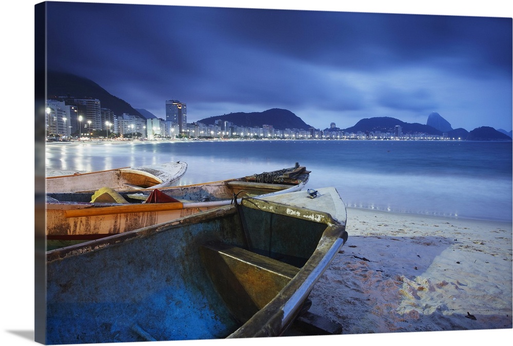 Fishing boats on Copacabana beach at dusk, Rio de Janeiro, Brazil