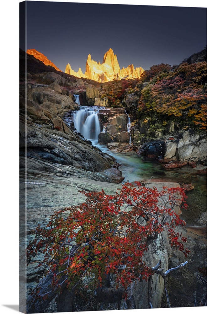 Fitzroy mountain and the Hidden waterfall at sunrise in the Los Glacieres National Park near El Chalten, Patagonia, Argentina