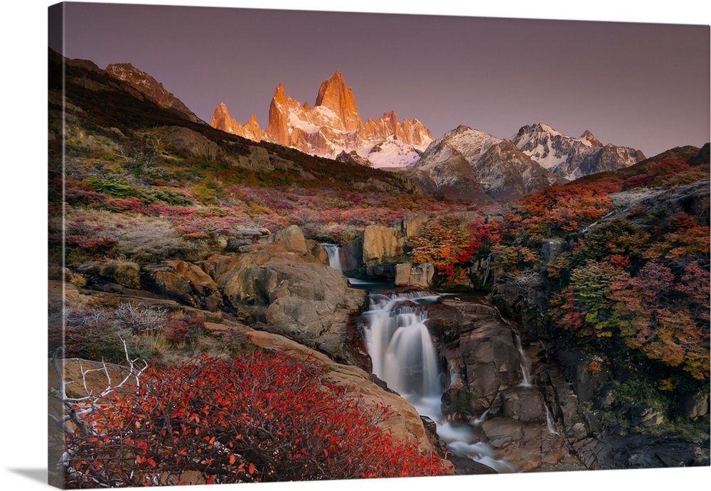 Fitzroy mountain and the Hidden waterfall at sunrise in the Los Glacieres National Park near El Chalten, Patagonia, Argentina