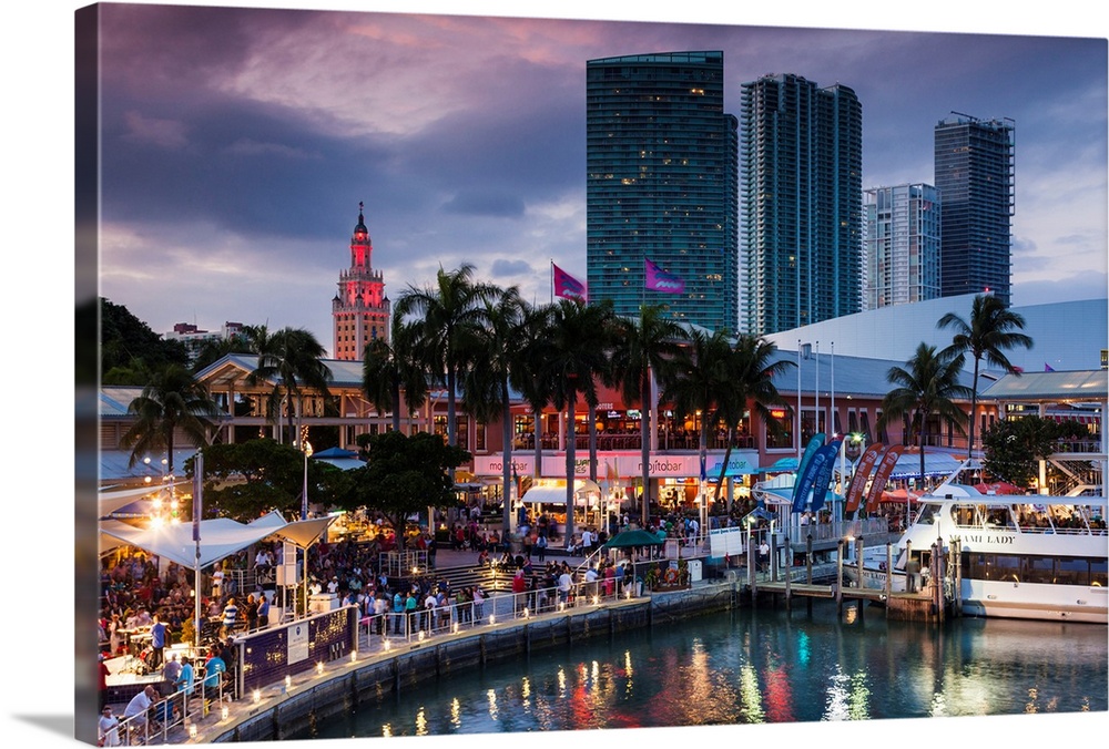 USA, Florida, Miami, city skyline with Bayside Mall and Fredom Tower, evening