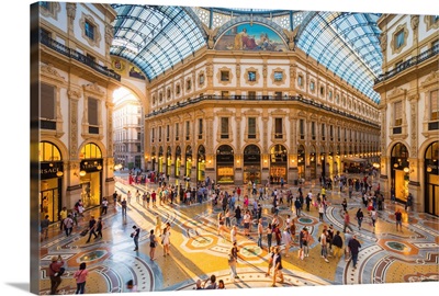 Galleria Vittorio Emanuele II. Tourists walking in the world's oldest shopping mall