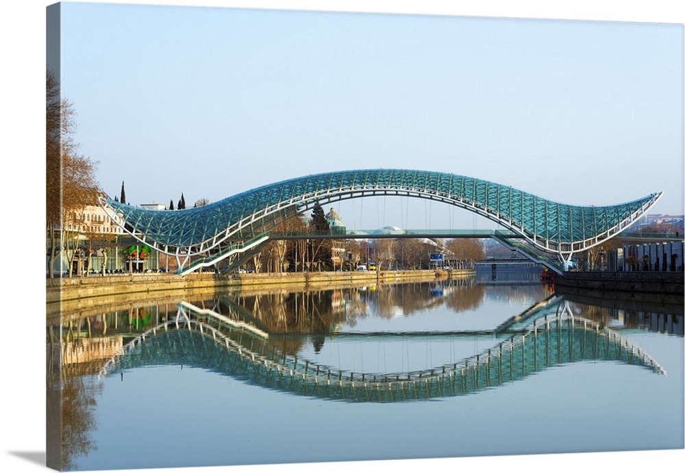 Eurasia, Caucasus region, Georgia, Tbilisi, Bridge of Peace on Mtkvari river.