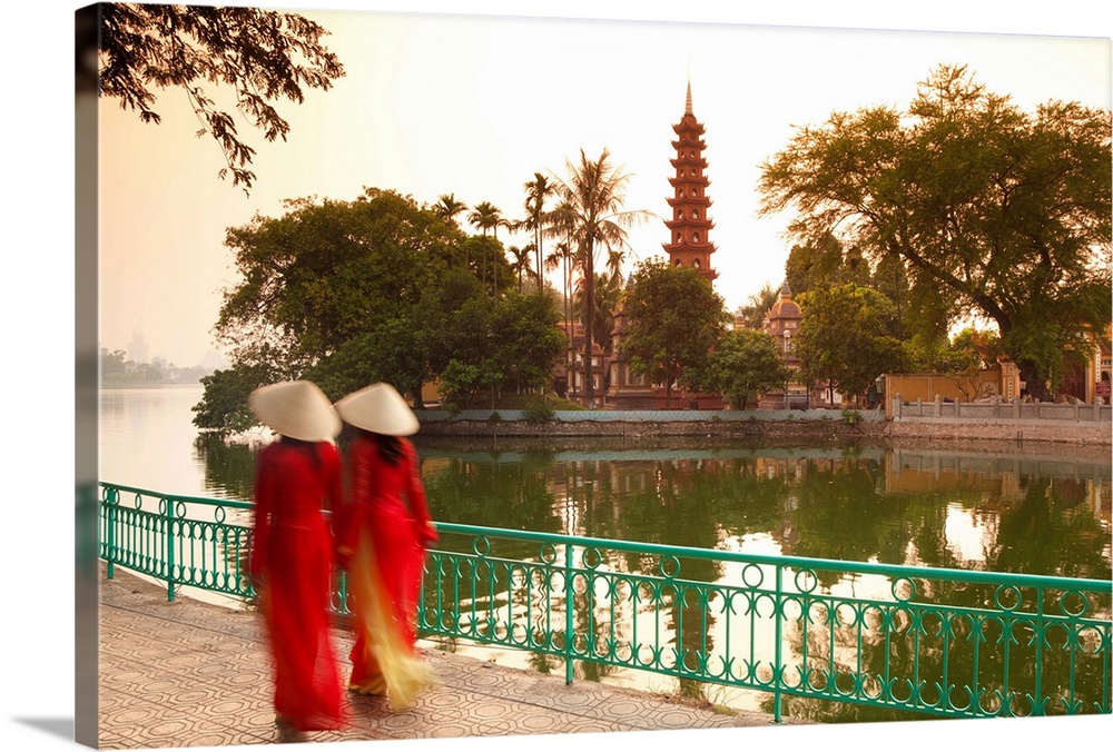 Girls wearing Ao Dai dress, Tran Quoc Pagoda, West Lake (Ho Tay), Hanoi, Vietnam