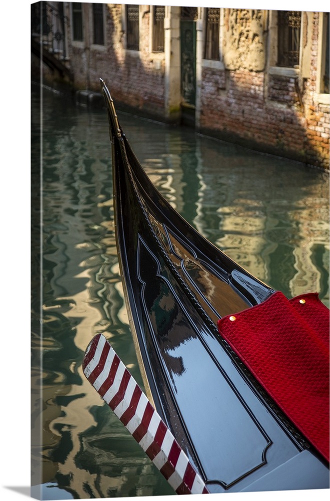 Gondolas on a canal in Venice, Vento, Italy.
