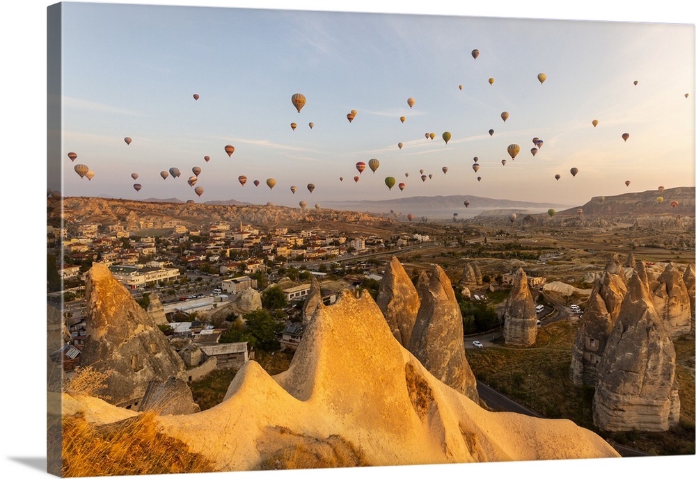 Hot air balloons flying in the sky of Goreme. Capadocia, Kaisery district, Anatolia, Turkey.