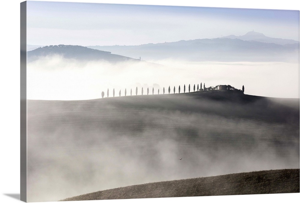 House in the mist, Val d'Orcia, Tuscany, Italy.