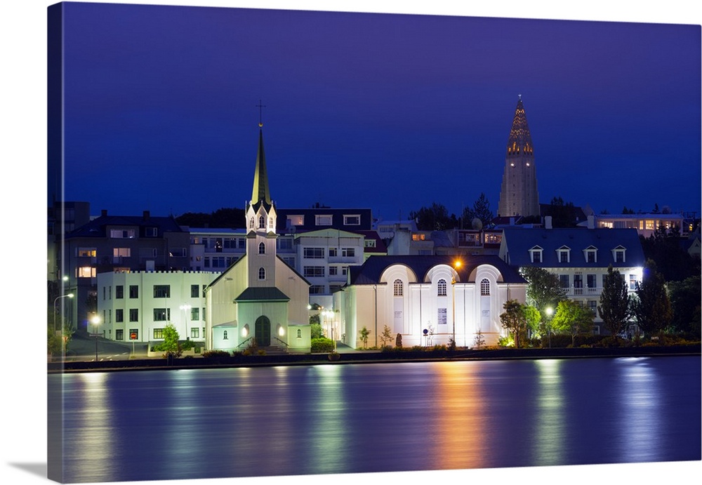 Iceland, Reykjavik, waterfront church on Lake Tjornin.