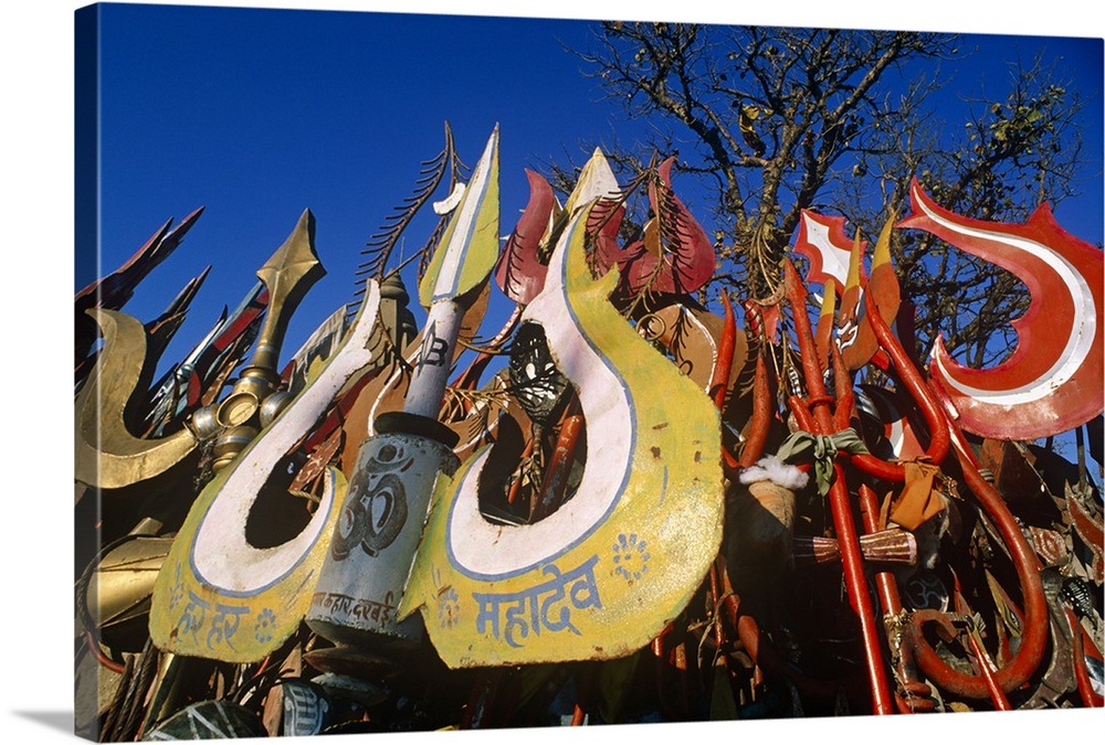 India, Madhya Pradesh, Chauragarh, nr Pachmarhi. Numerous tridents, or trishulas, which are emblematic of the Hindu god sh...