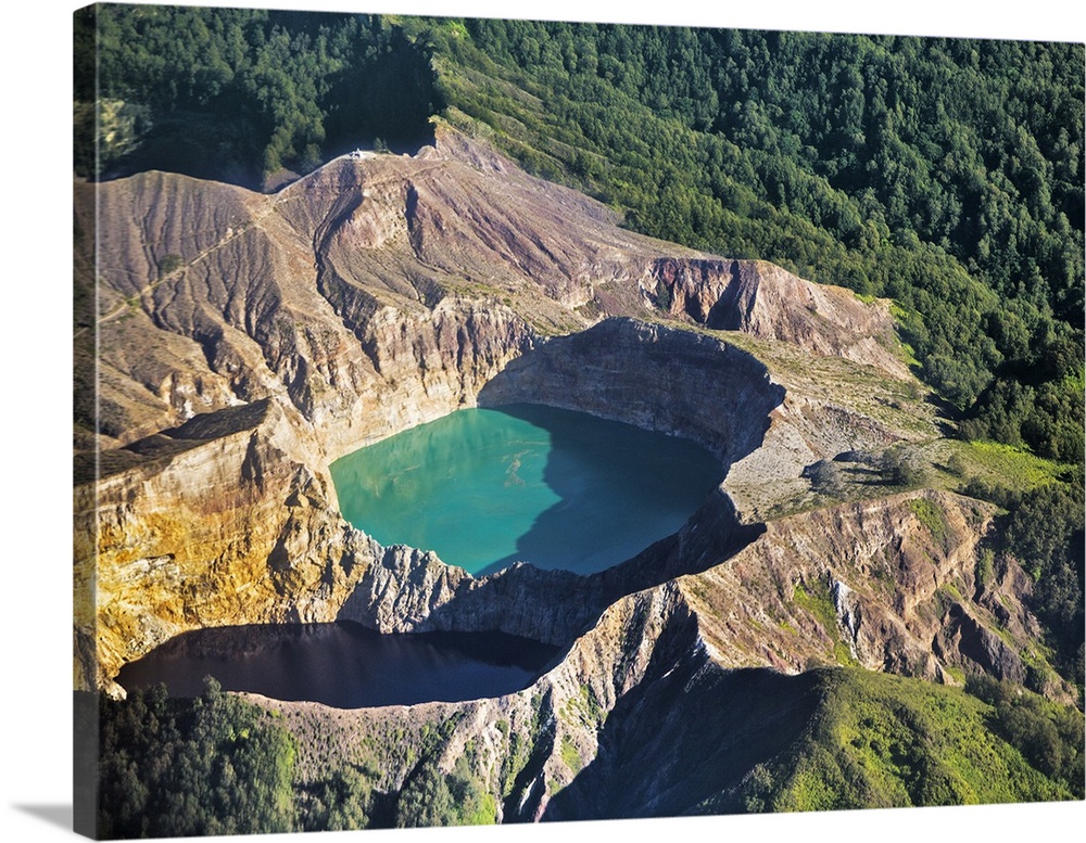 Indonesia, Flores Island, Kelimutu. Two stunning crater lakes in the caldera of Mount Kelimutu from the air.